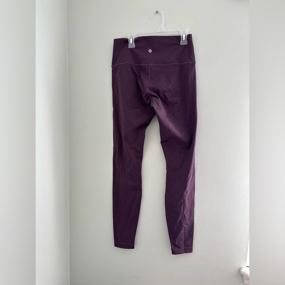 Purple Lululemon Wonder Train leggings size 8 28”